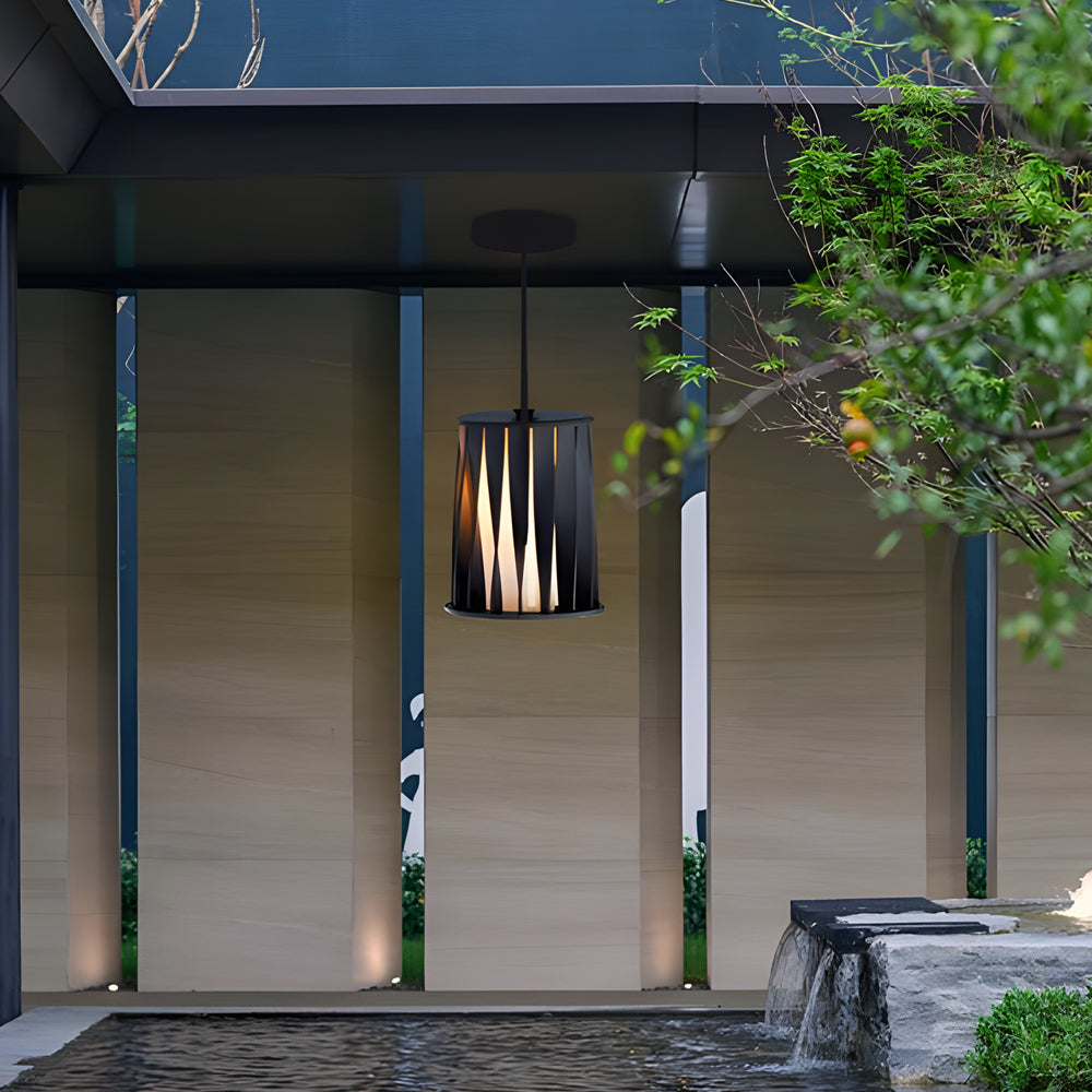 Modern home entrance with cylindrical pendant lights creating dramatic lighting effect at entryway