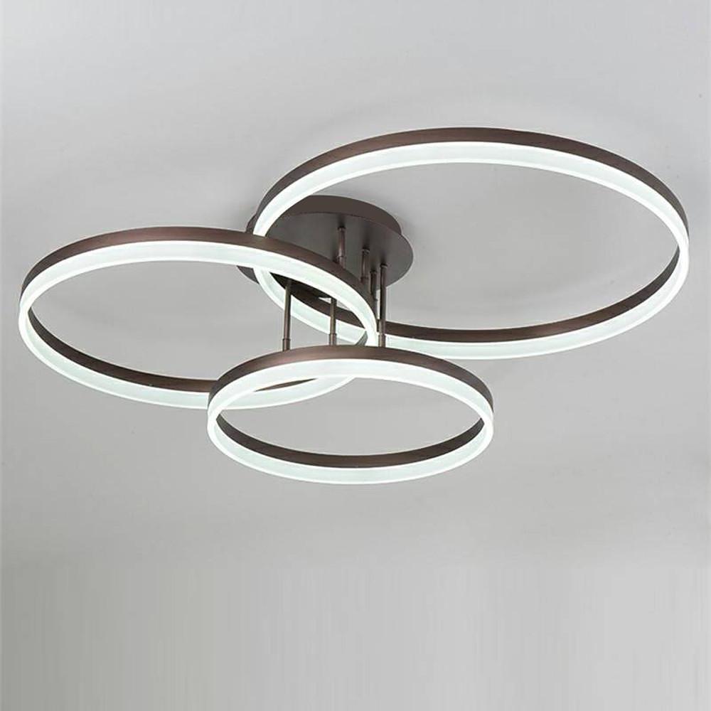 Sleek 3-ring flush mount ceiling light with warm LED illumination mounted flush to the ceiling.