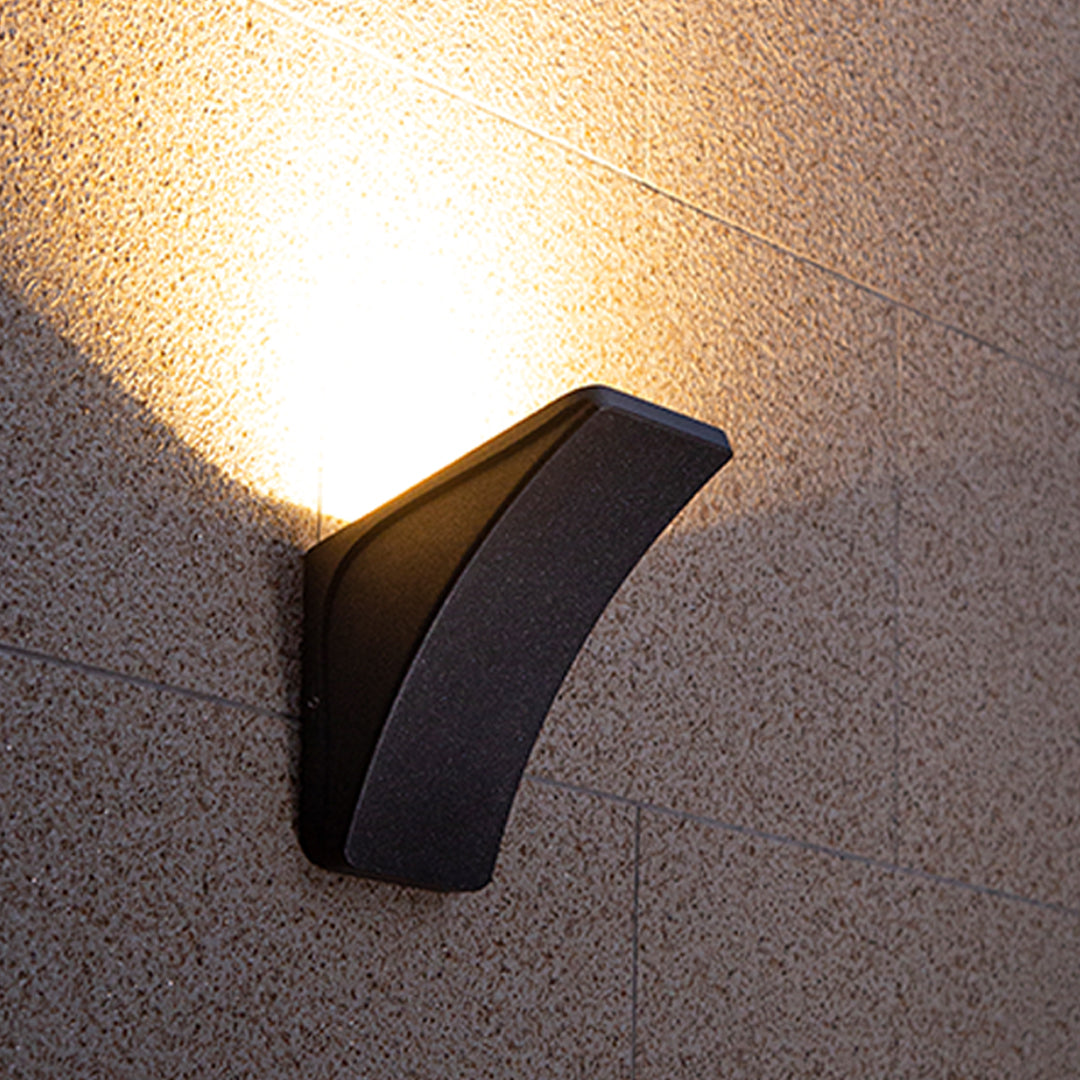 Sleek gray geometric wall light with angular design and modern architectural styling