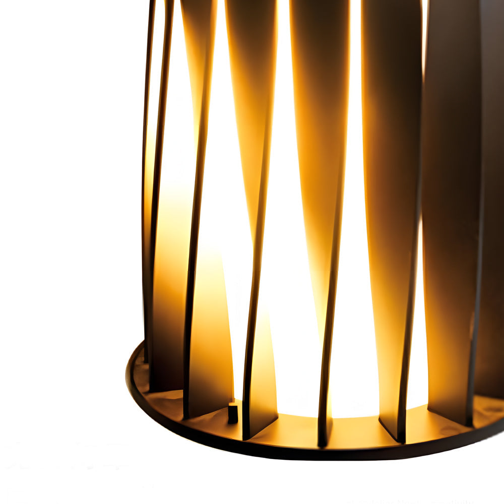Close-up detail of illuminated wooden slat light fixture showing warm glow and construction details