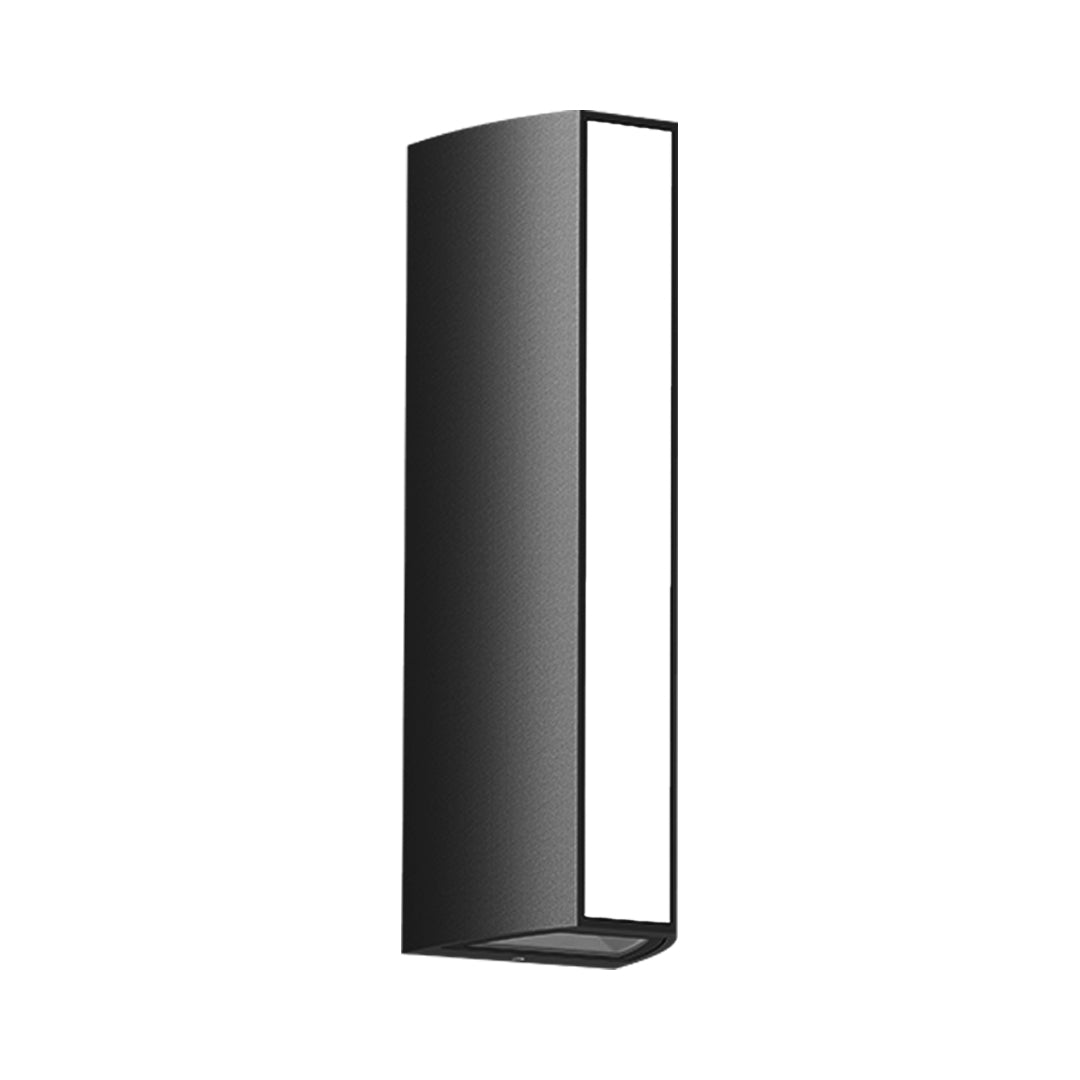 Vertical LED wall sconce mounted on textured stone exterior creating ambient lighting
