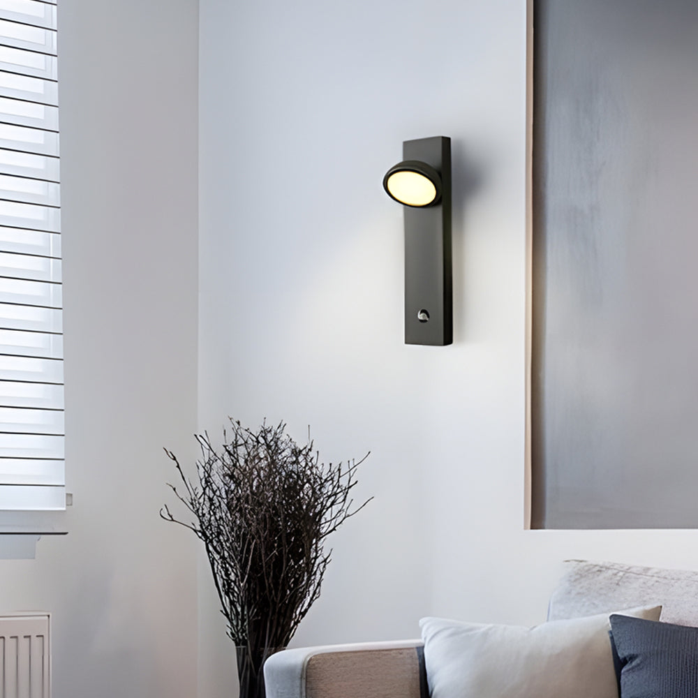Accent wall lamp installed near window adding soft directional light.