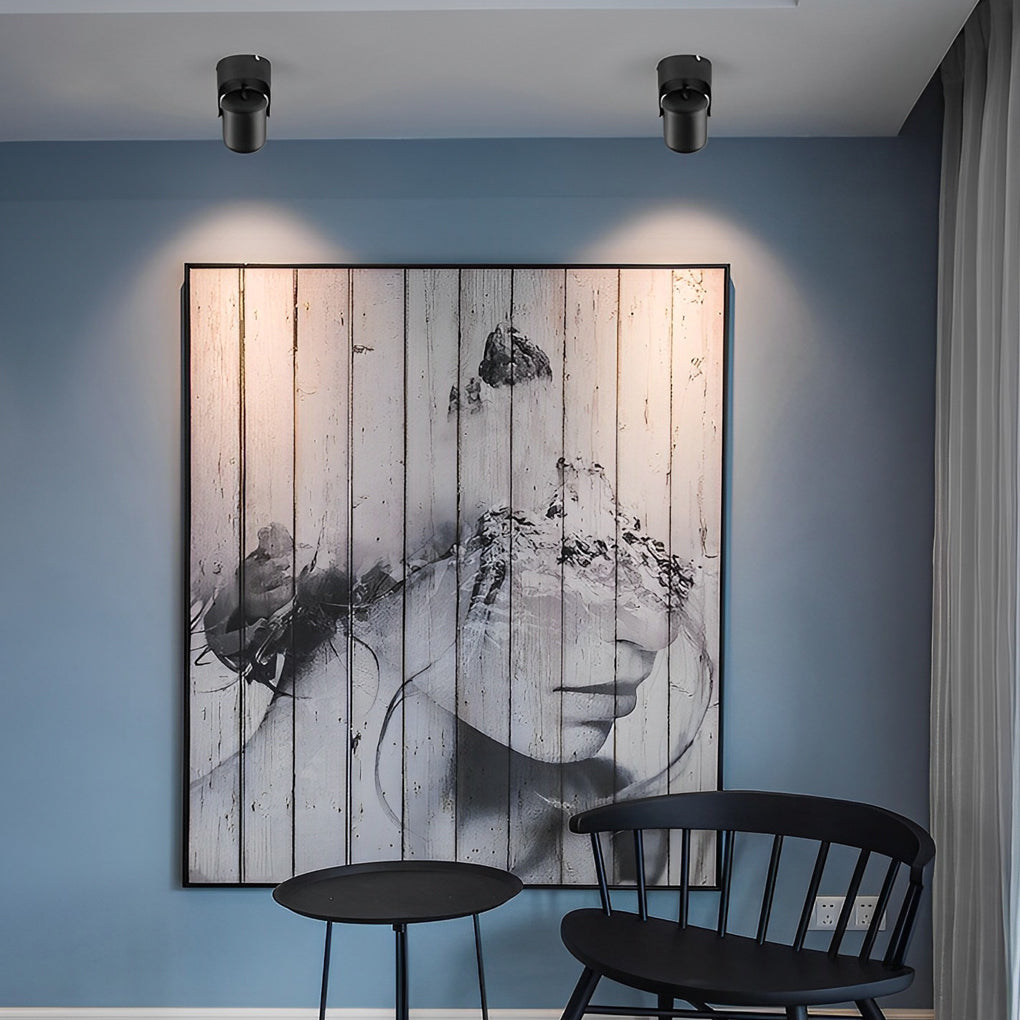 Adjustable downlights with a white finish, illuminating a contemporary kitchen.