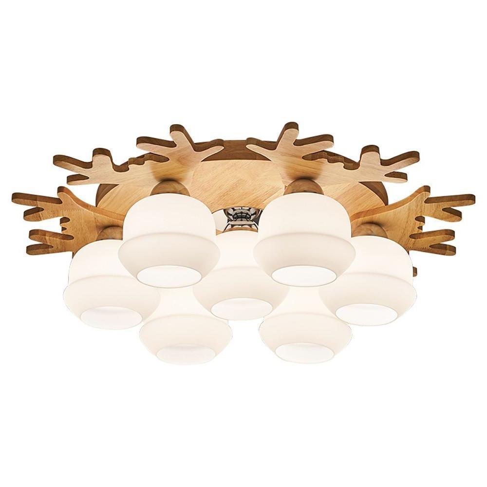 Soft ambient lighting created by a warm toned globe ceiling lamp in a minimalist living space.