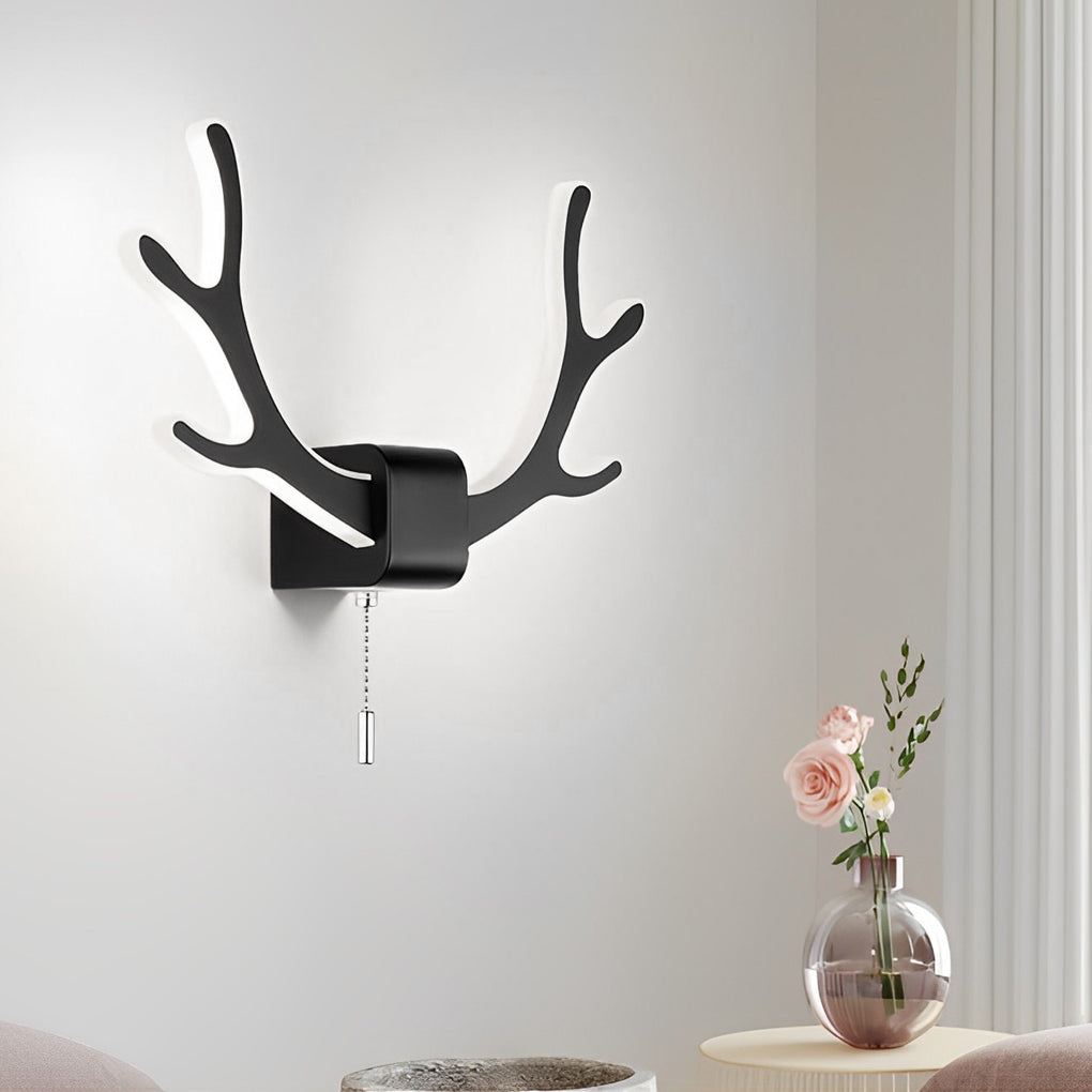 Antler wall sconce light styled in a minimalist interior, combining sculptural antler form with soft diffused glow.