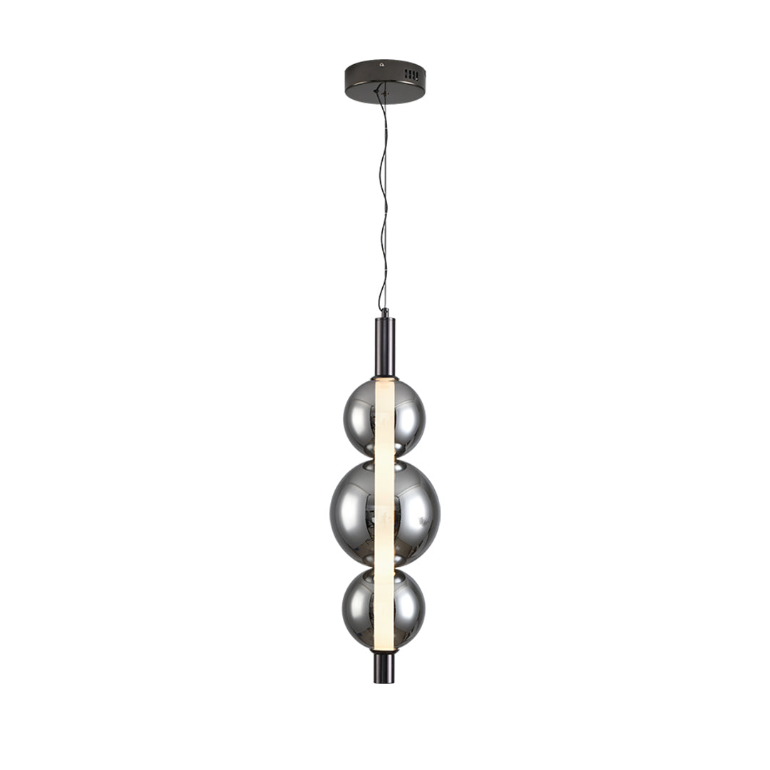 Artistic modern silver pendant light featuring transparent globe in modern dining room interior