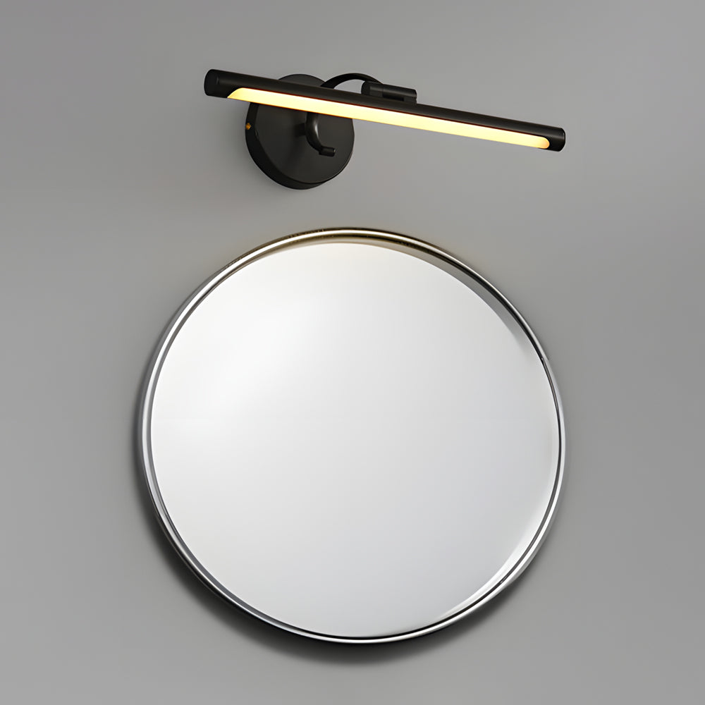 Gold bathroom vanity strip light above a mirror in a modern bathroom, adding warmth and a sleek, stylish touch to the space.