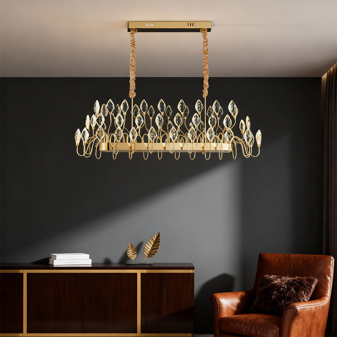 Crystal gold LED chandelier in a bedroom with neutral tones.
