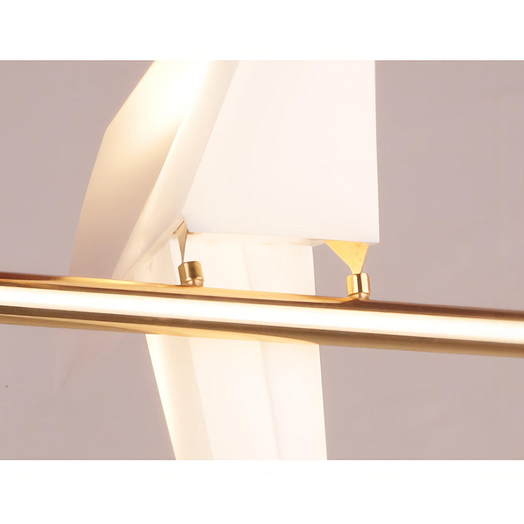 Bird wall light with a close-up of its bird-shaped lampshade and golden details.