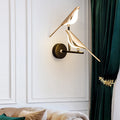 Bird wall light installed on a modern living room wall with decorative panels