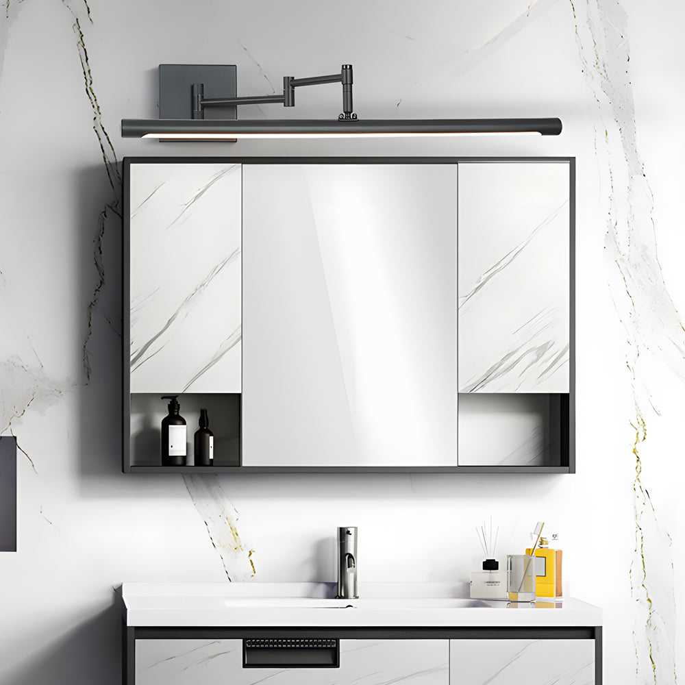 Black bar vanity light mounted above a modern bathroom mirror