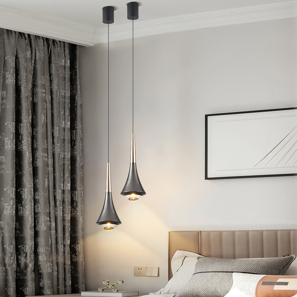 Black cone pendant lights suspended beside a modern bedroom creating soft accent lighting.
