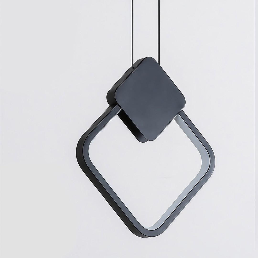 Close-up detail of black geometric pendant light square frame design.