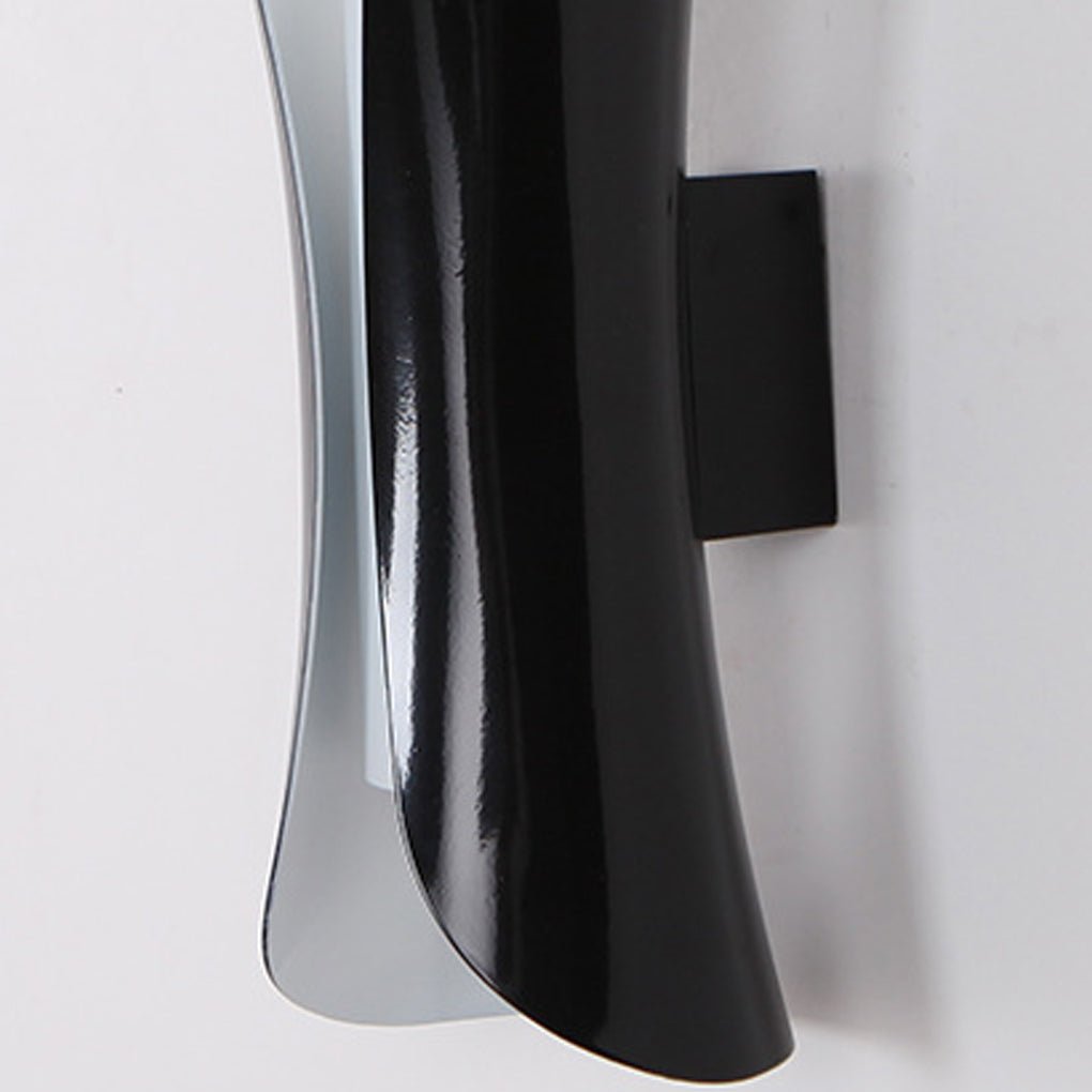 Side view of black indoor up down wall lights mounted on wall bracket.