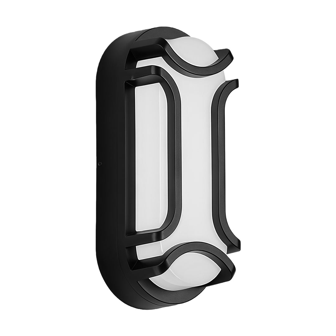 Sleek black outdoor wall sconce installed on a beige wall, providing stylish lighting for an outdoor patio.