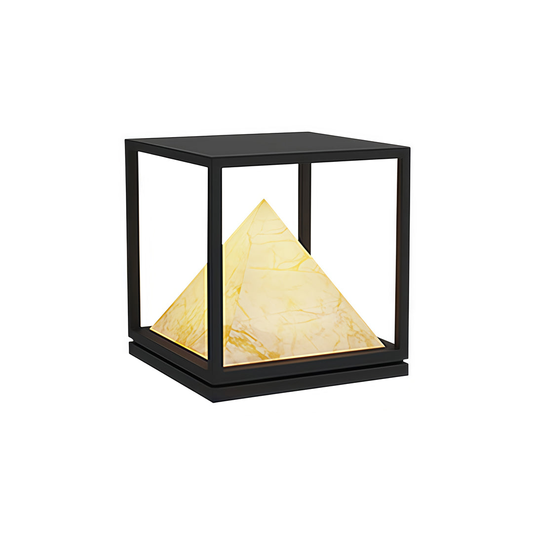Black cube outdoor light featuring illuminated pyramid diffuser in elegant light pillar design.
