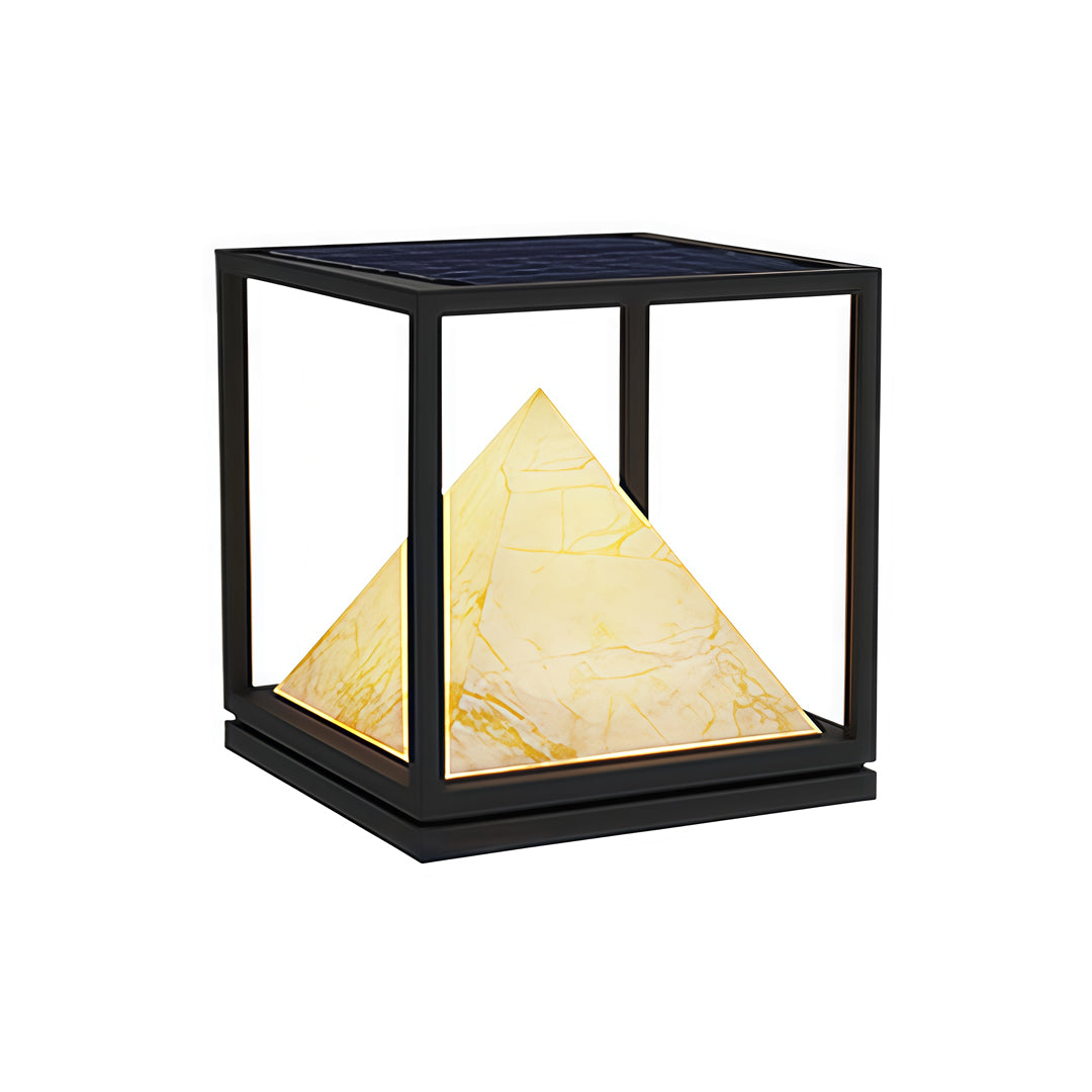Black-frame lighting pillar with pyramid-shaped warm illumination for modern outdoor landscape design.