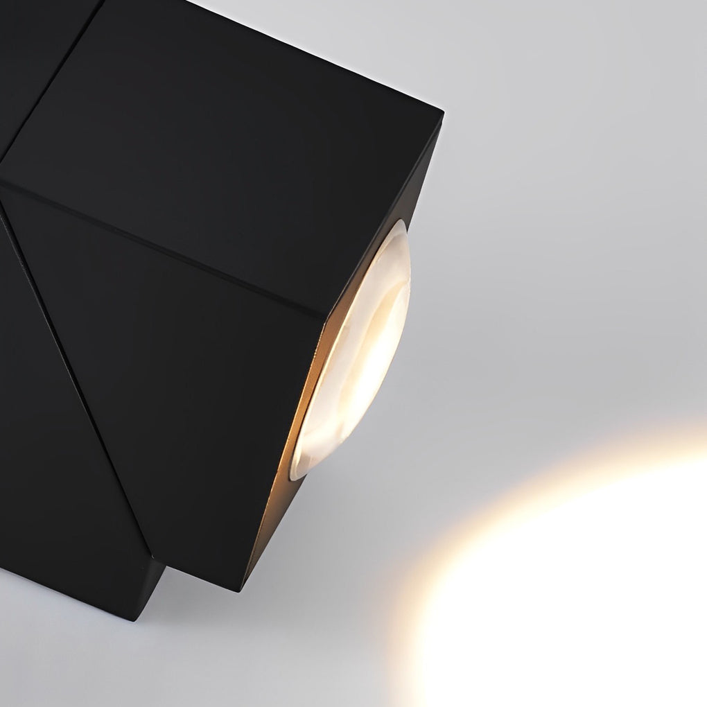 Black up down sconce outdoor fixture with angular design and dual light sources for contemporary style.