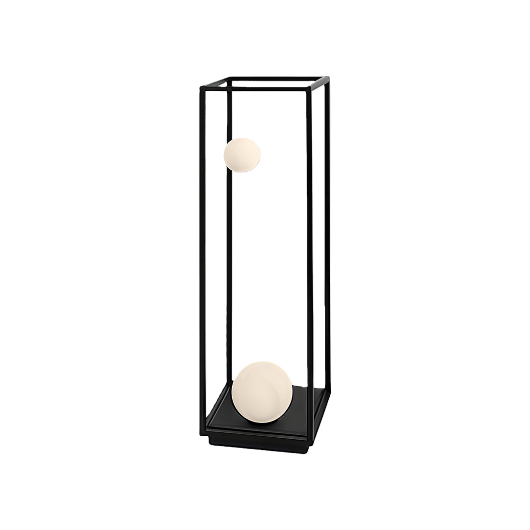 Set of bollard outdoor lights arranged along a pathway, offering warm lighting with contemporary design.