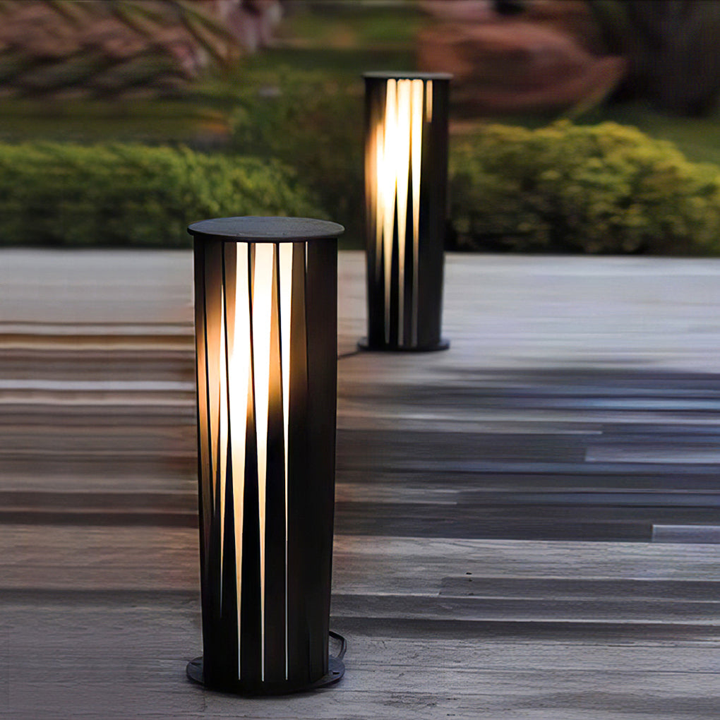 Short and tall bollard path lights installed on wooden deck walkway.