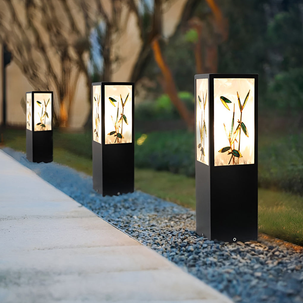 Bollard pathway lights enhancing a contemporary outdoor path with elegant ambient light.