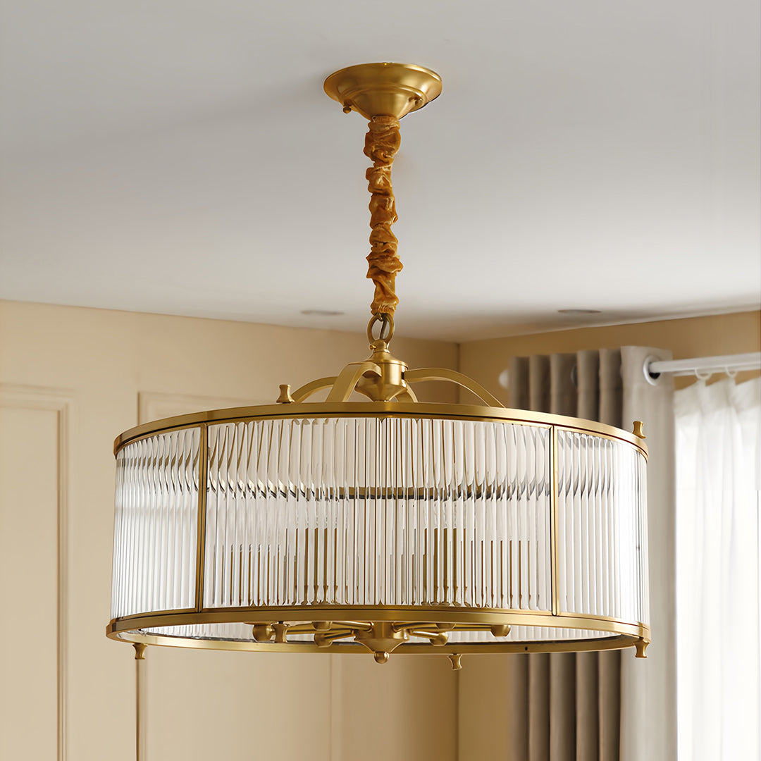 Brass semi flush mount ceiling light suspended in minimalist dining space with neutral color palette
