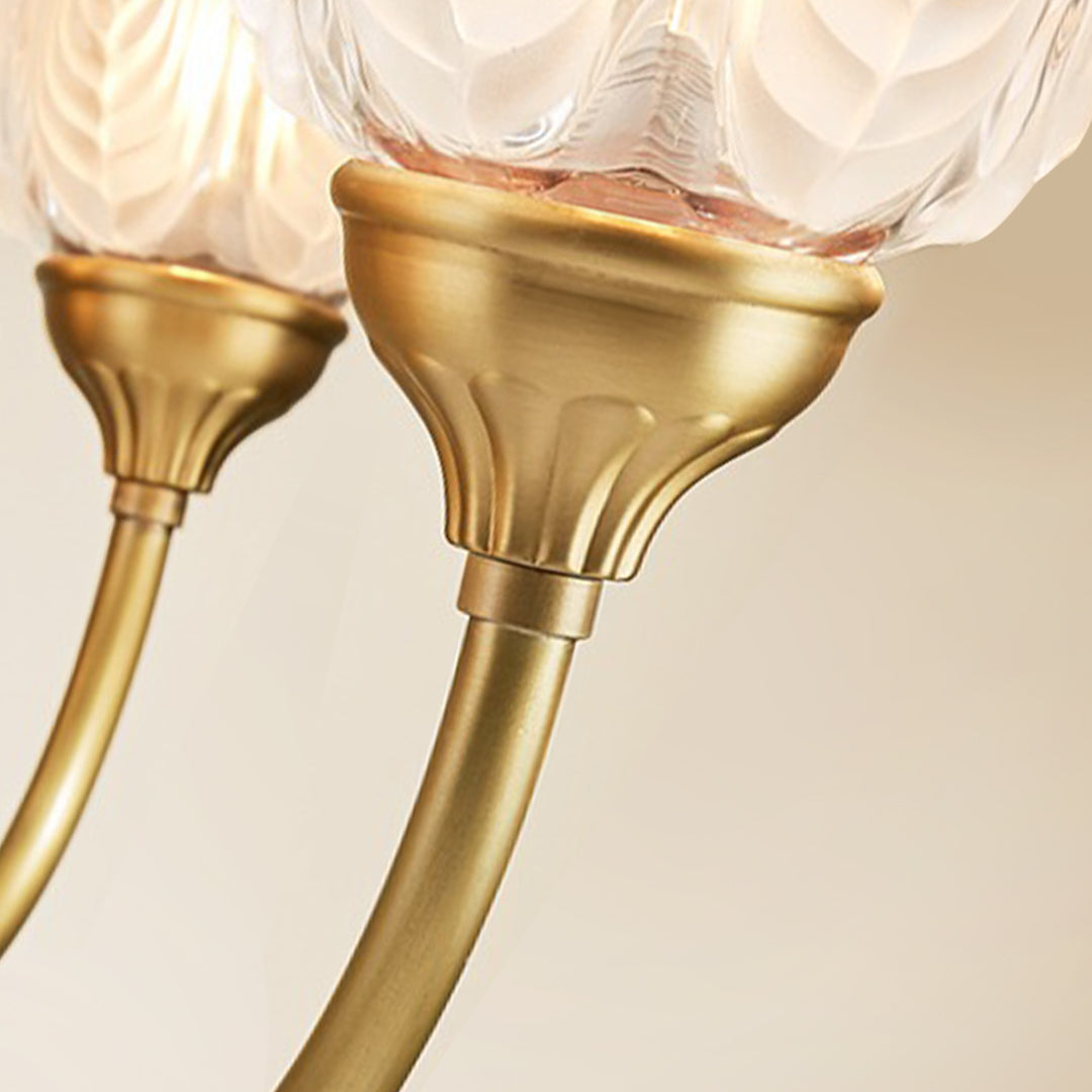 Close-up detail of brass wall light showcasing premium metalwork and elegant curved design