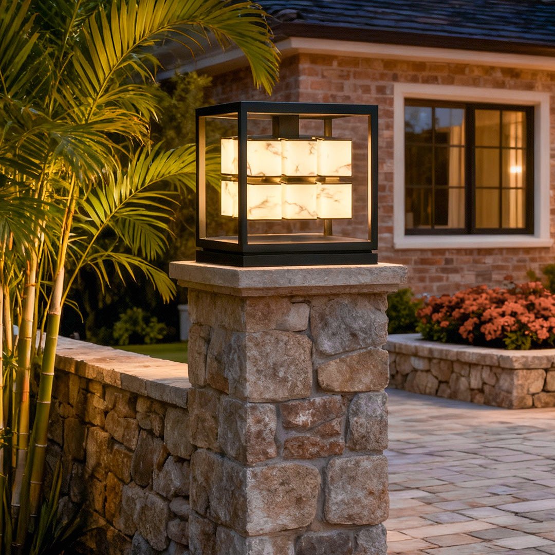 Brick pillar solar light installed at outdoor home entrance