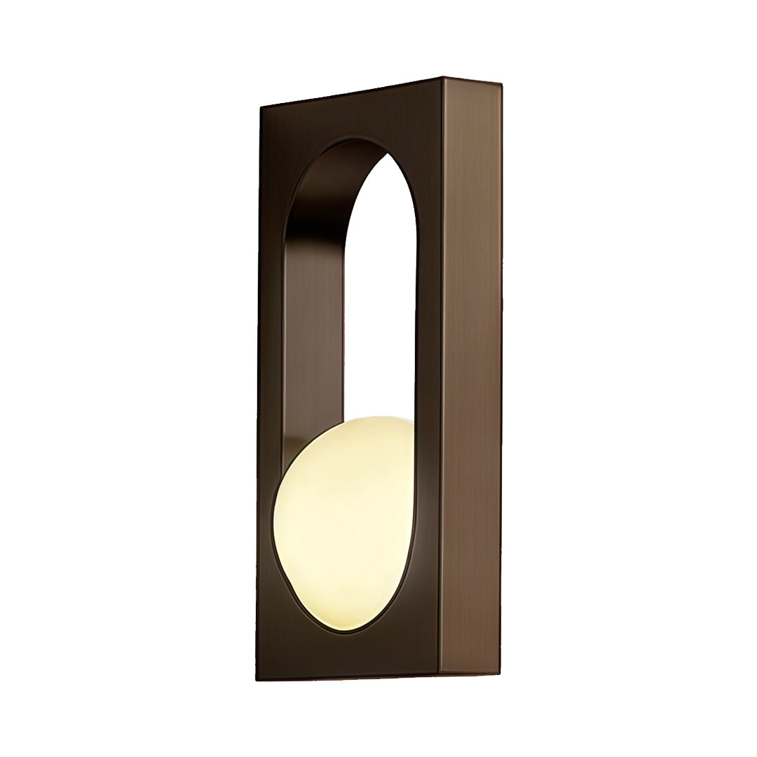 Bronze minimalist wall sconce with a warm diffuser, presenting simple yet stylish led outdoor wall lighting ideas for patios and walkways.