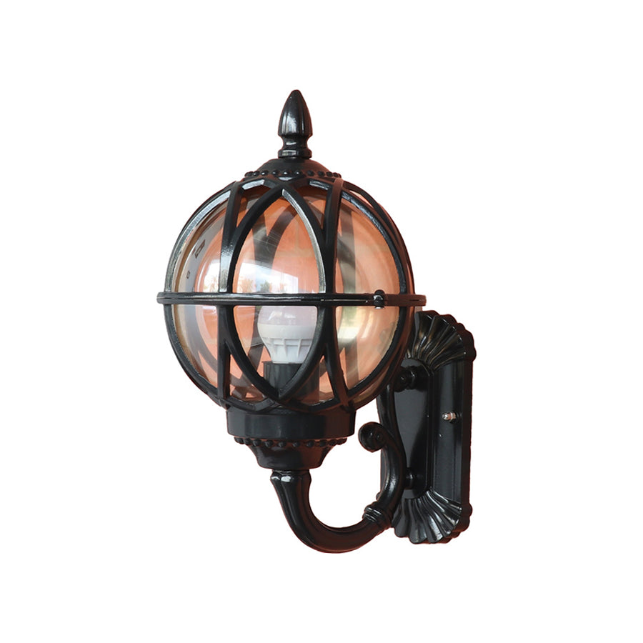 Dark bronze nautical wall sconce with protective glass globe and maritime design