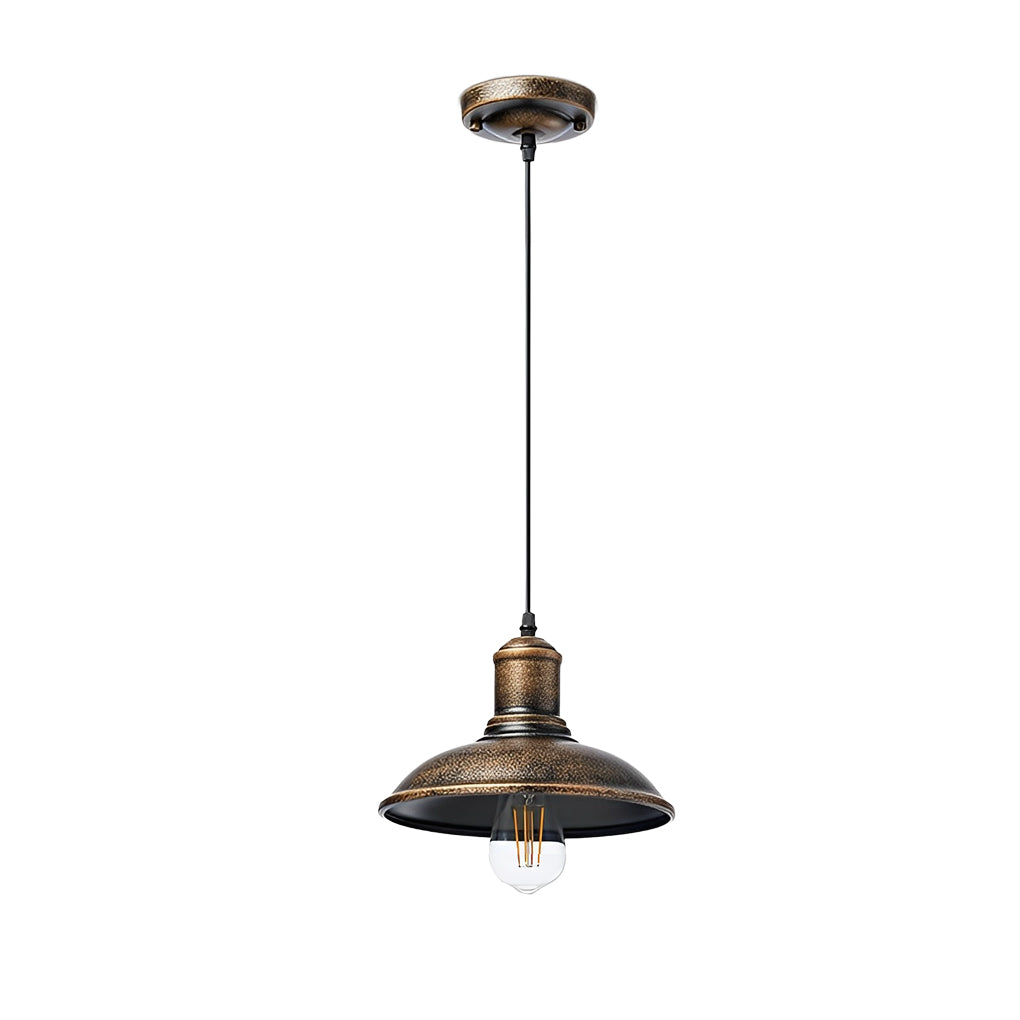 Bronze pendant lighting fixture hanging in a modern kitchen, blending rustic and contemporary styles.