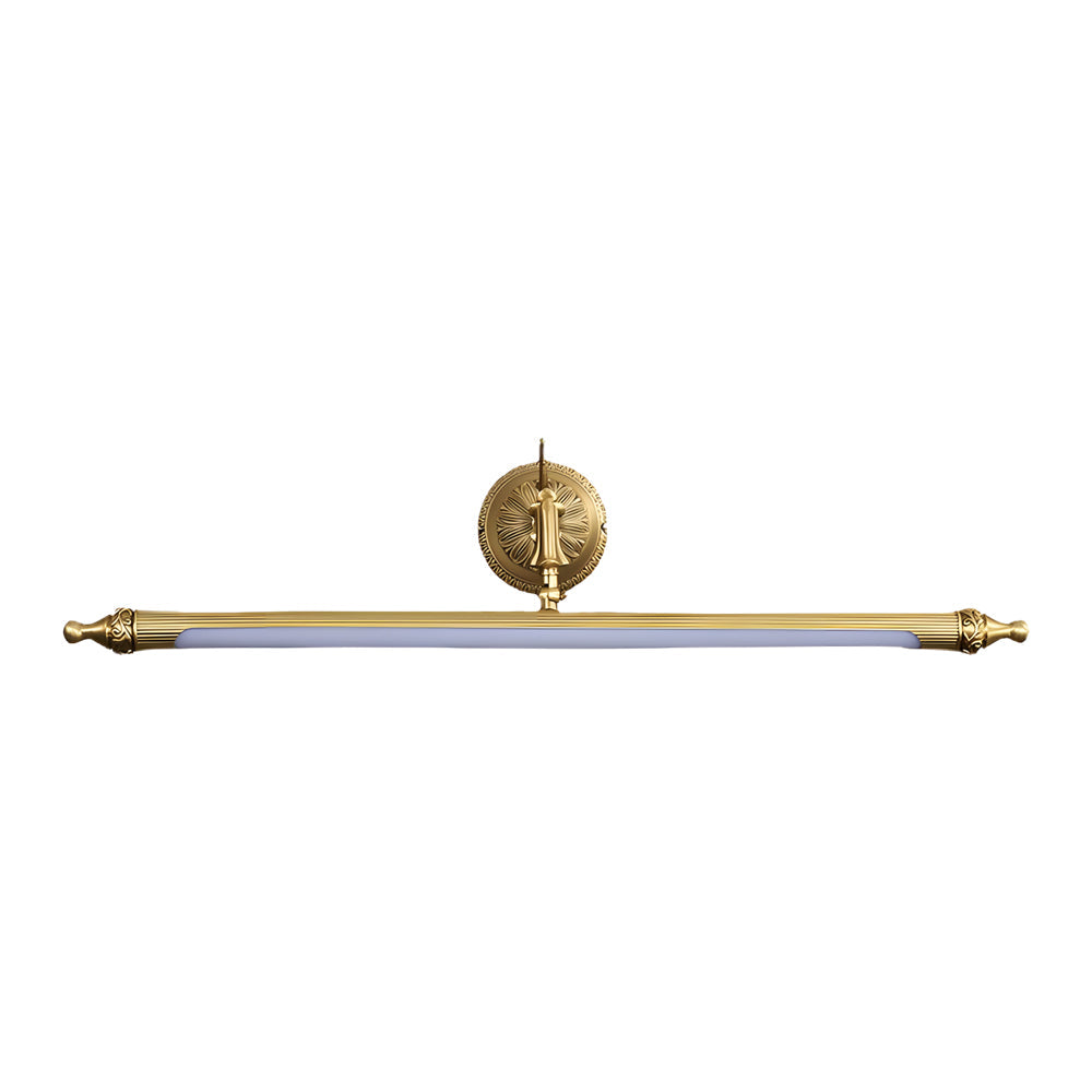 Close-up of brushed gold finish on vanity light bar