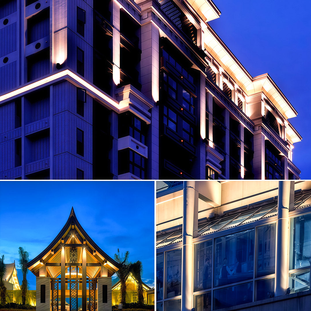 Commercial building facade illuminated by decorative wall wash lighting.