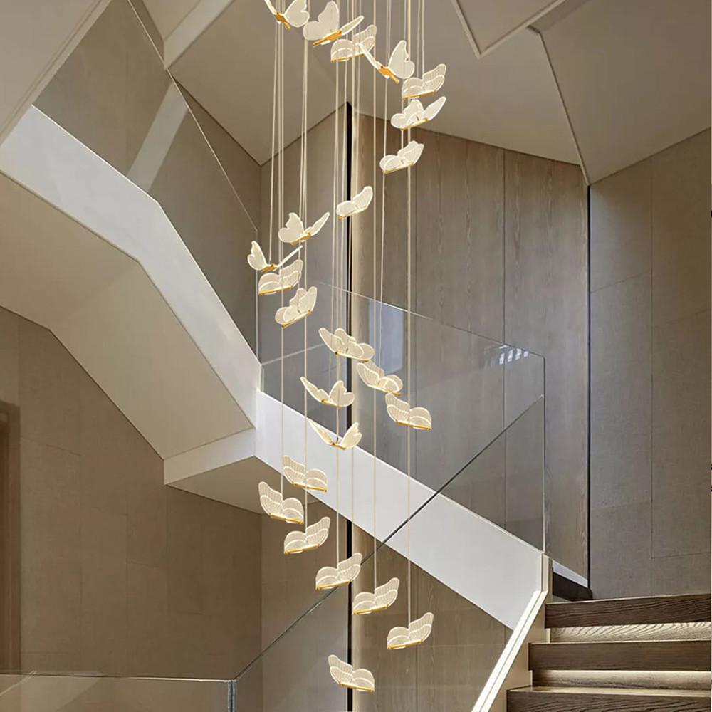 Close-up of butterfly chandelier pendants showing delicate wing details.