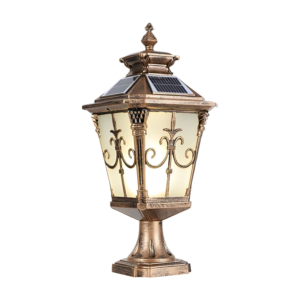 Cast aluminum post light featuring bronze accents and frosted glass, illuminating a driveway entrance.