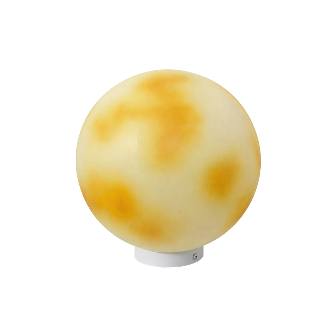 Celestial moon-shaped stone pillar light with orange spots isolated on a white background ok.