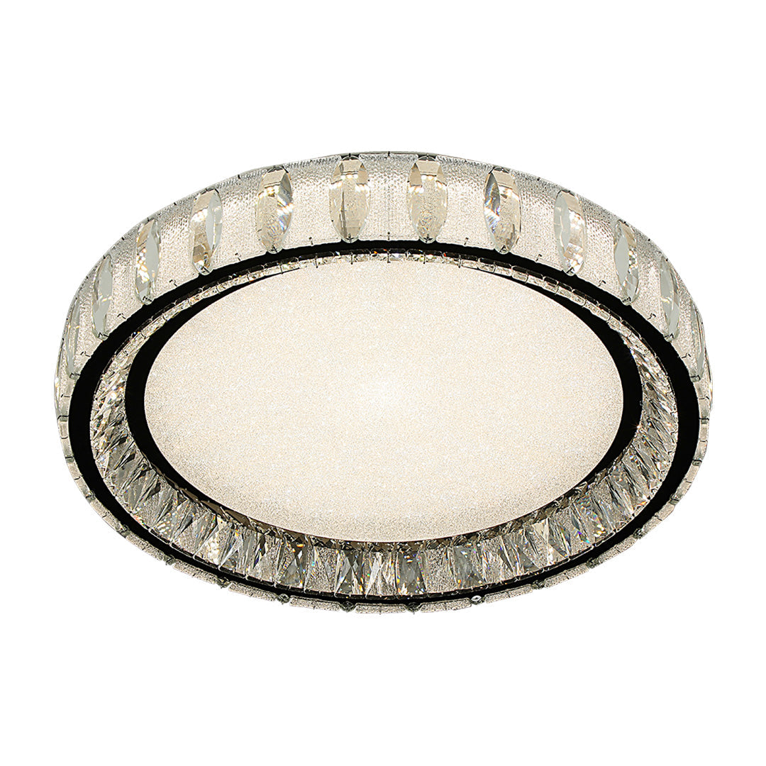 Chrome flush mount light featuring a double-ring design with crystal details and a metallic finish.