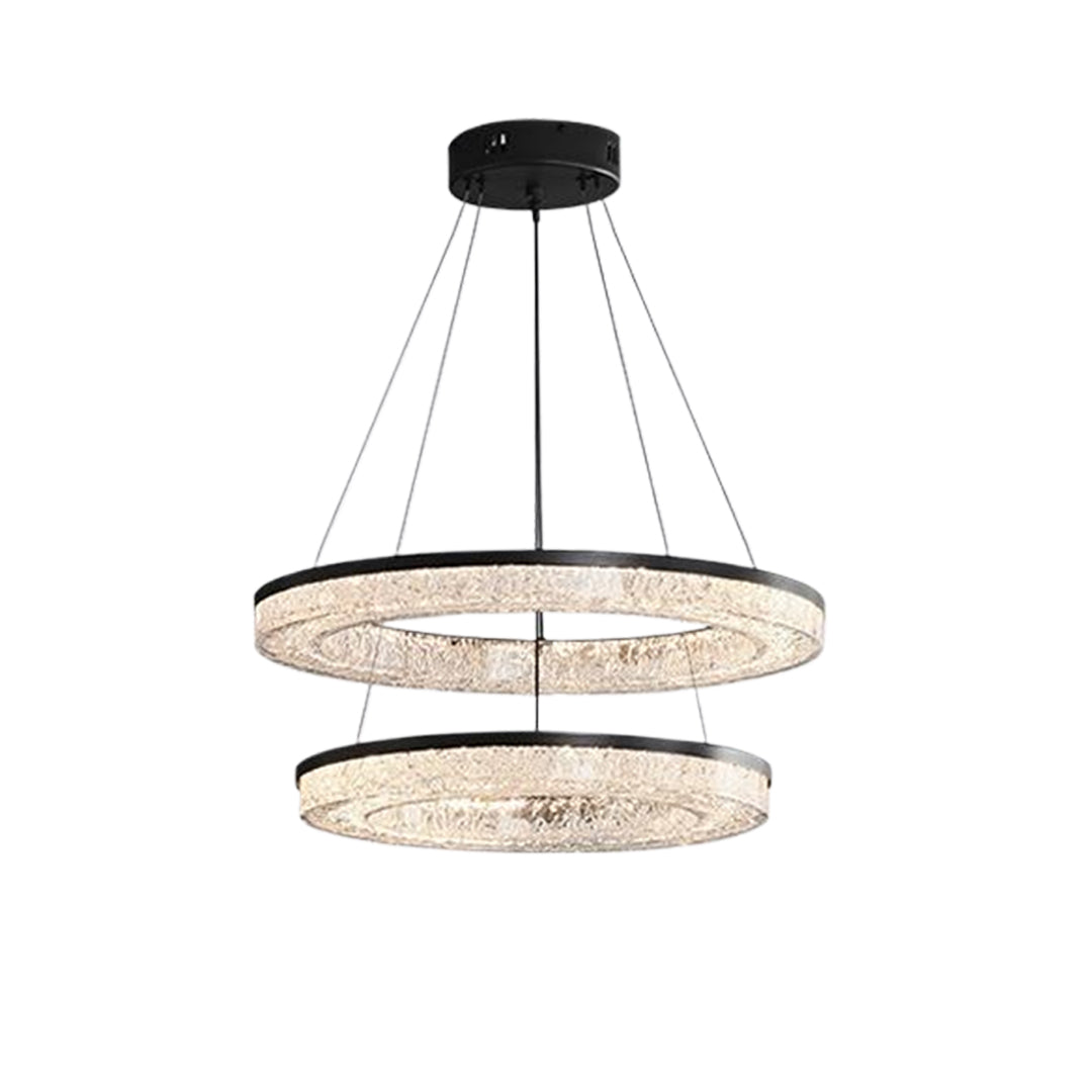 Close up of a circle pendant light with a metallic frame, highlighting its intricate design and texture.