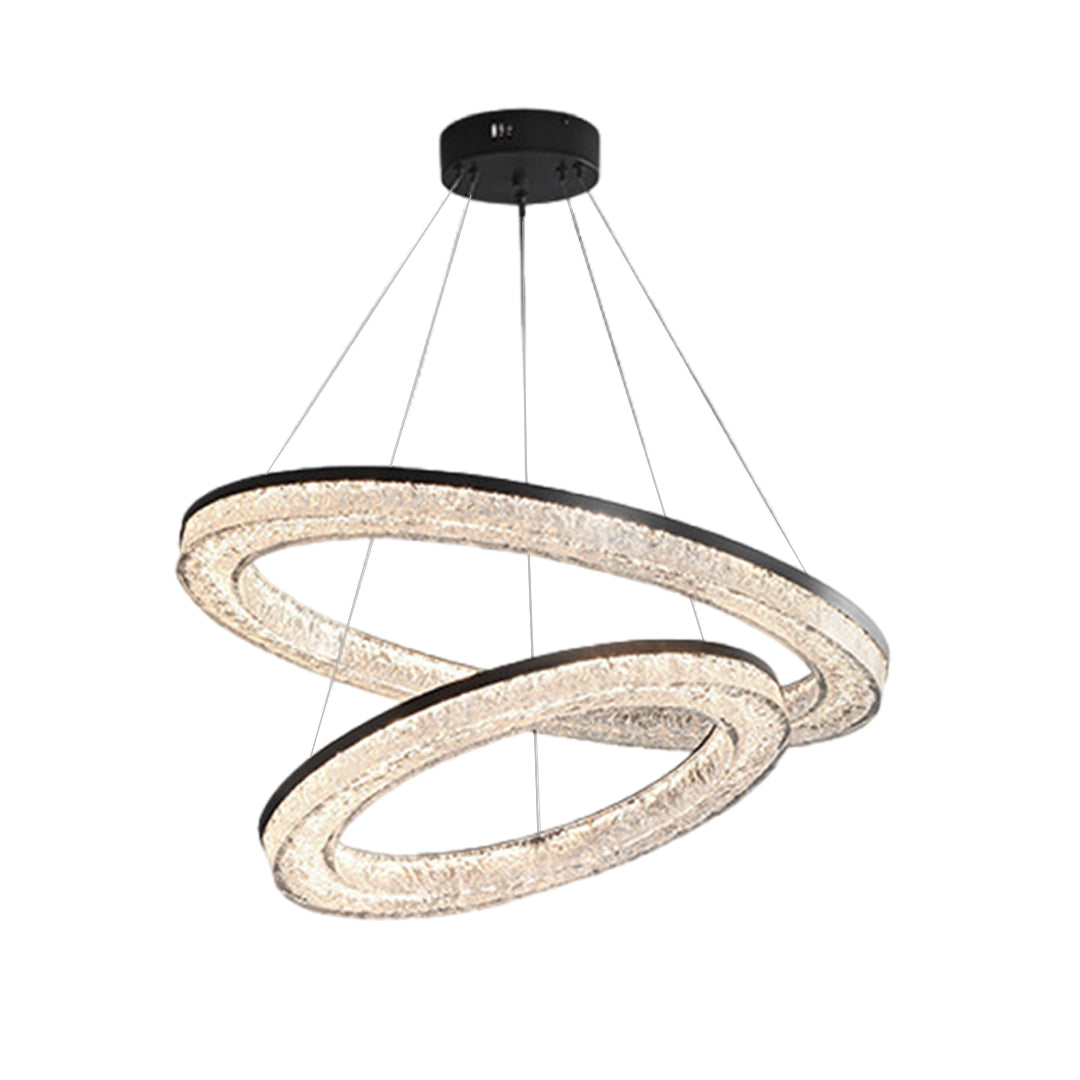 Circle pendant light with a metallic frame, adding elegance to a modern living room with a gray sofa.