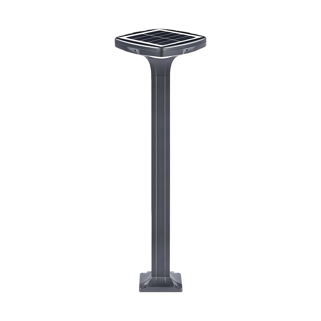 Classic black outdoor wall light with warm white glow, illuminating the garden gate.