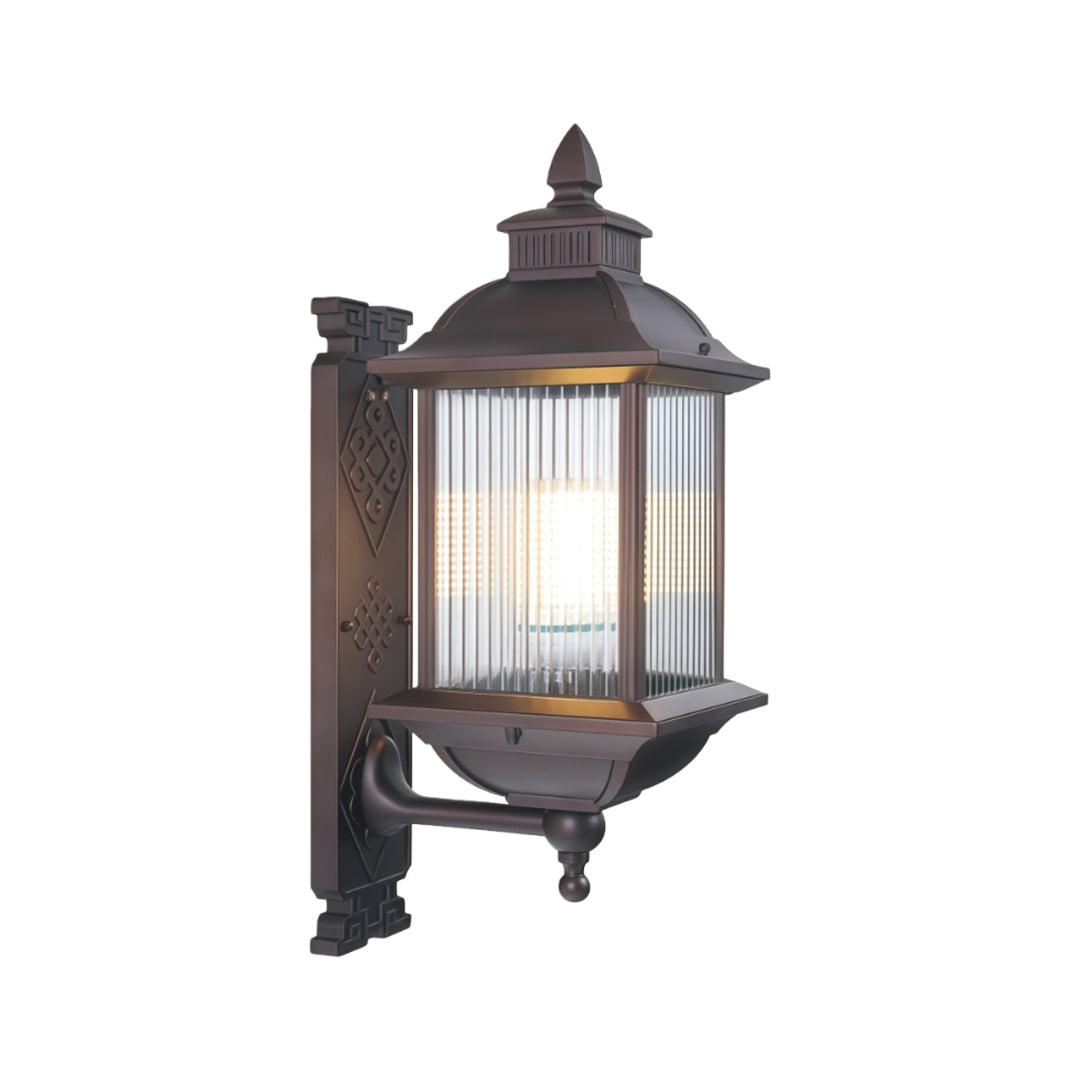 Classic retro outdoor wall light fixture with transparent glass shade and dark metal frame on white background