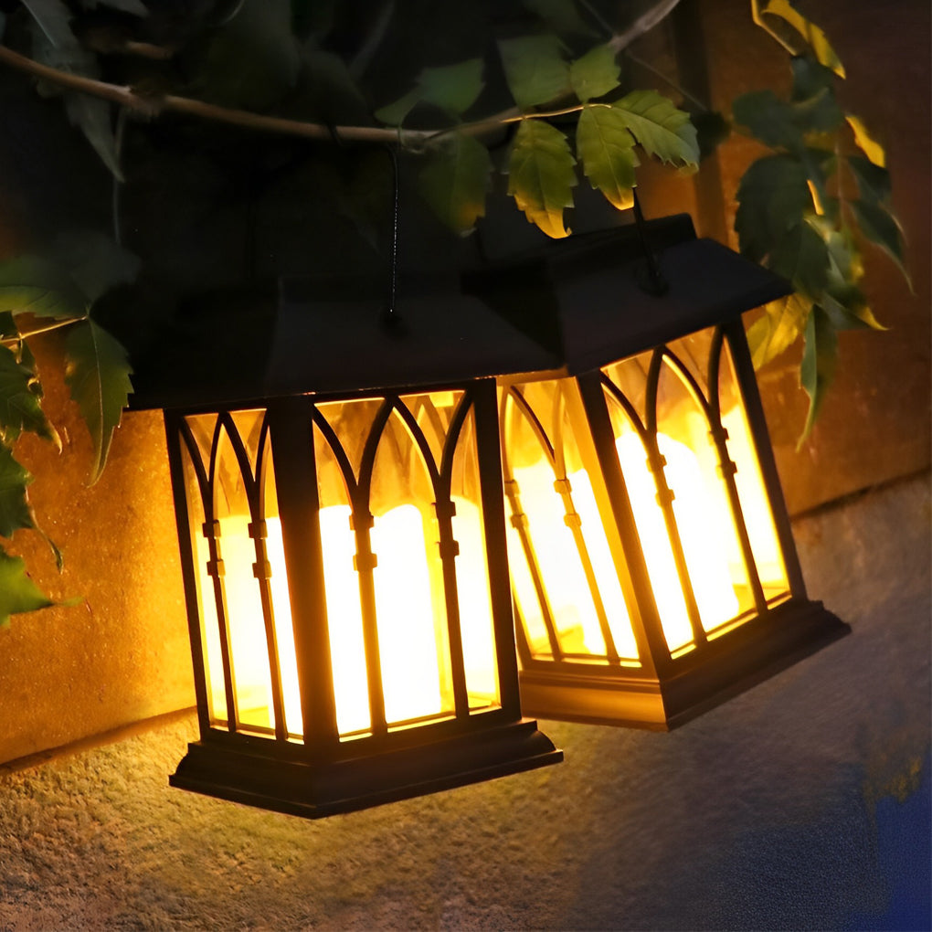 Close-up of candlestick lantern showing detailed black metal frame.