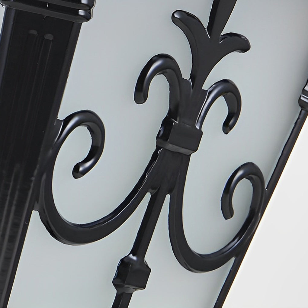 Close-up of a cast aluminum post light base with intricate bronze design and sturdy construction.