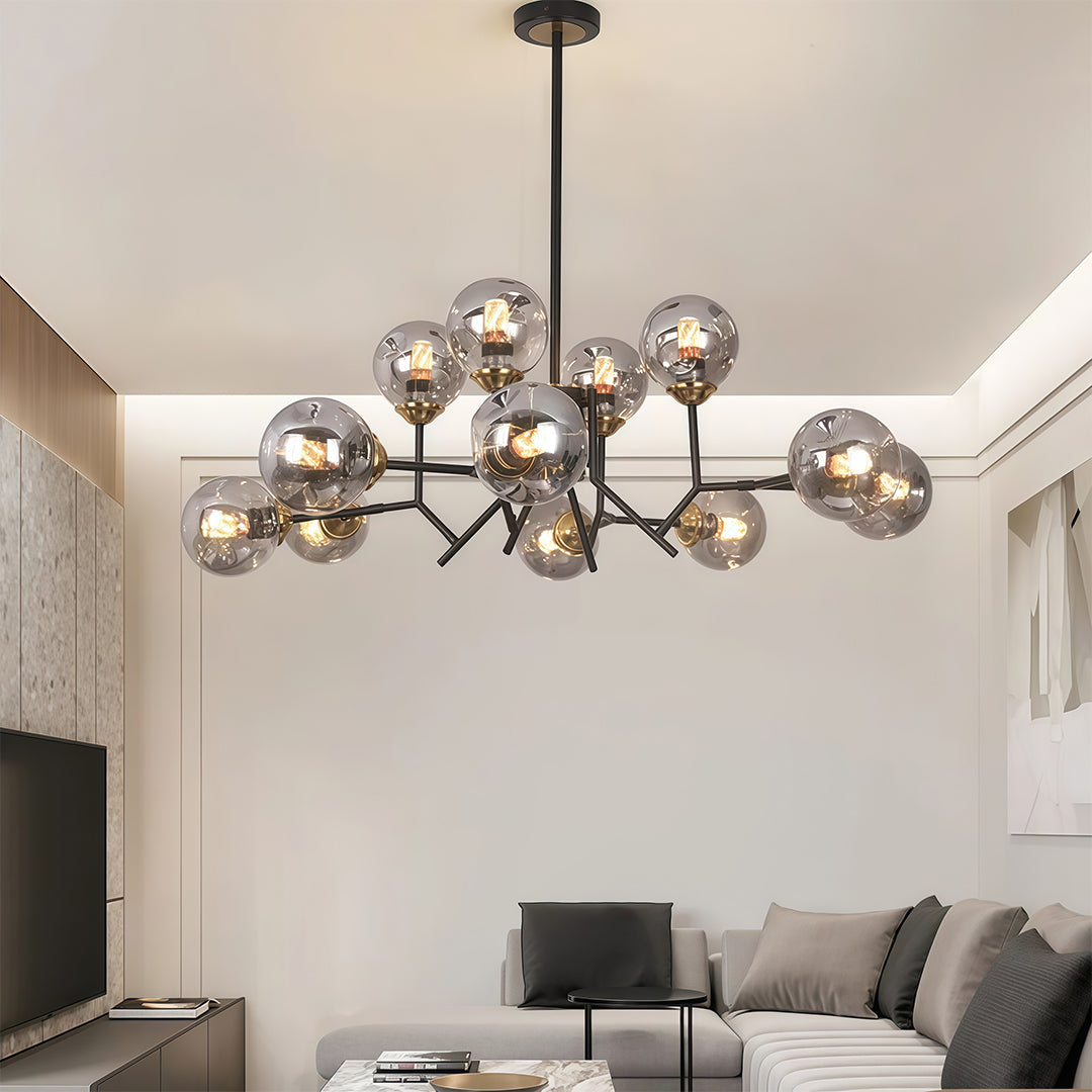 Glass globe chandelier with a close-up of the glass globes, showcasing the intricate design and light reflection.