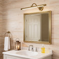 Close-up of LED vanity bathroom lights, showcasing the detailed brass finish and adjustable arm.