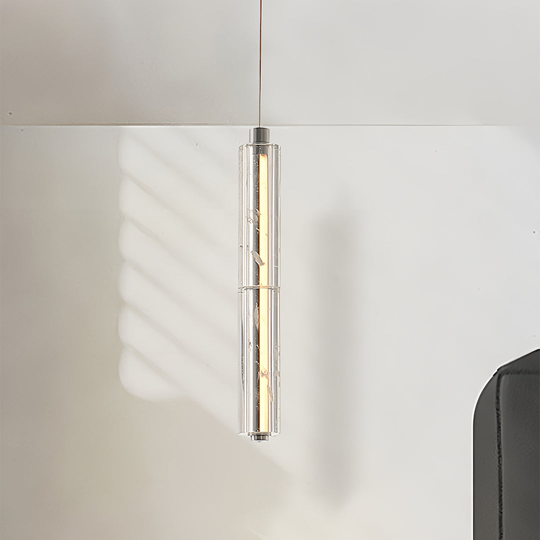 Close-up of a modern crystal pendant light showcasing its intricate crystal details and elegant design.