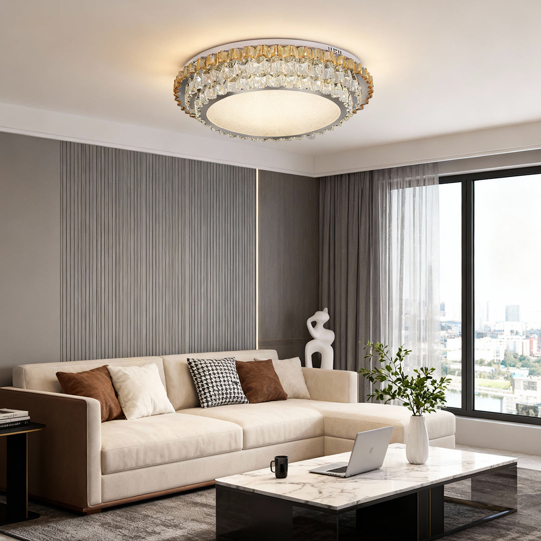 Close-up of a modern flush mount light, highlighting the gold and crystal details.