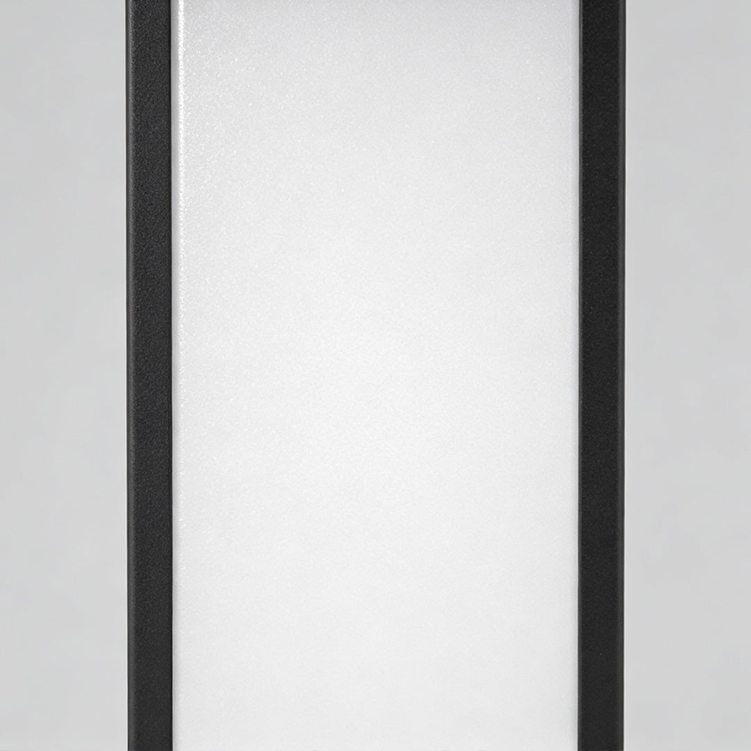 Close-up of square handheld lantern showing sleek black frame and frosted glass.