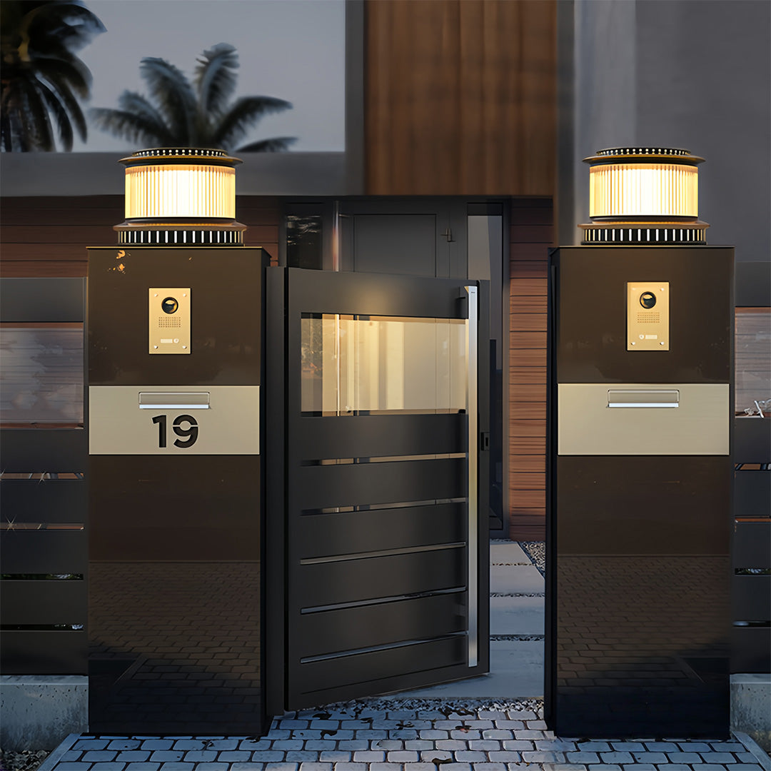 Close-up shot of a stainless steel pillar lights with a sleek, polished finish, offering modern outdoor lighting.