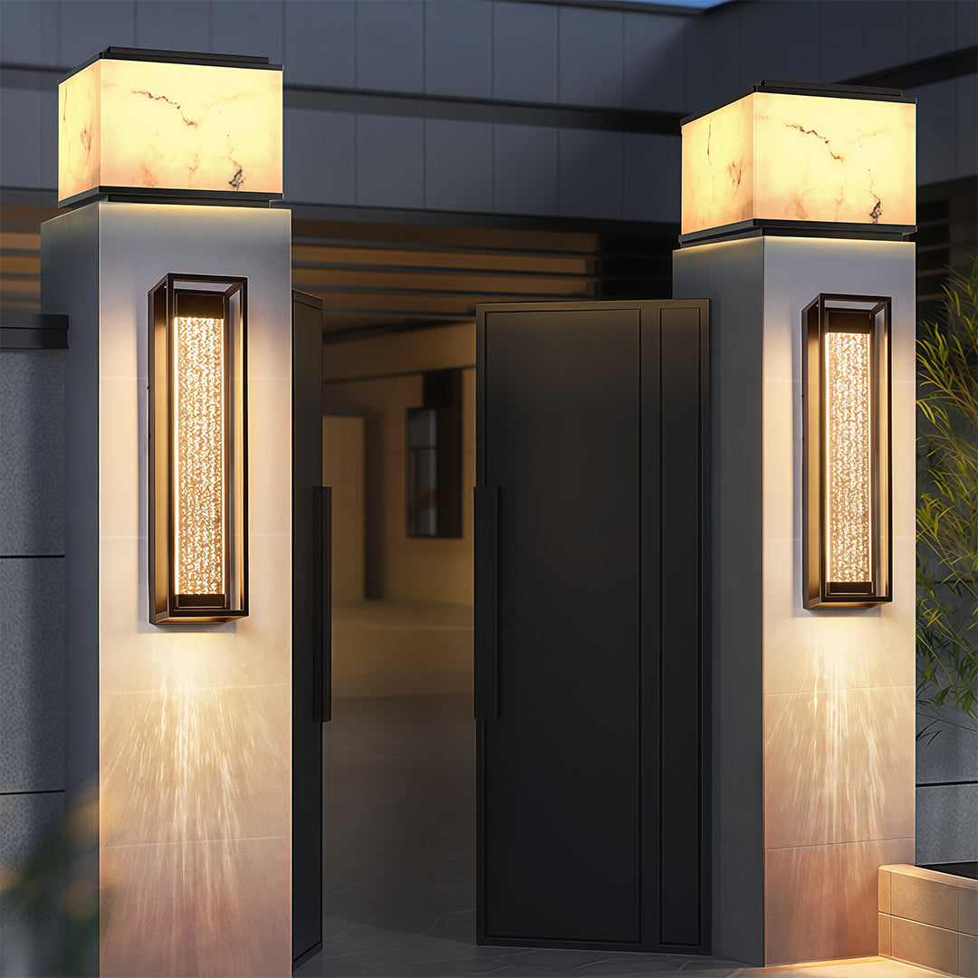 Outdoor sconces black with a close-up view of the textured glass, showcasing its unique design details.